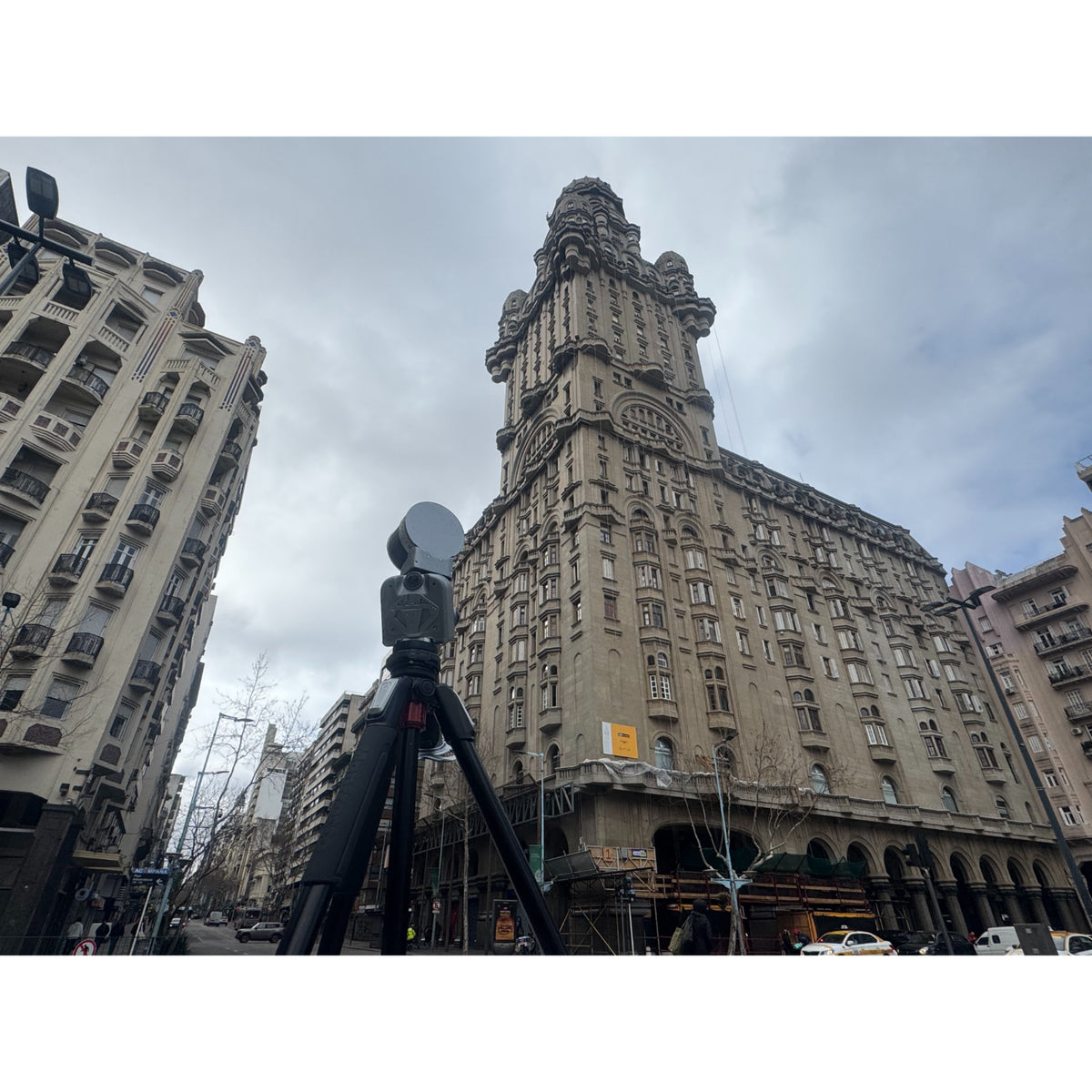 FJD Trion T1 mounted on a tripod in the center of a city complex for terrestrial laser scanning