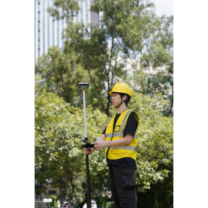 surveyor using the FJ Dynamics V10a GNSS Rover with E600 Controller for outdoor surveying 