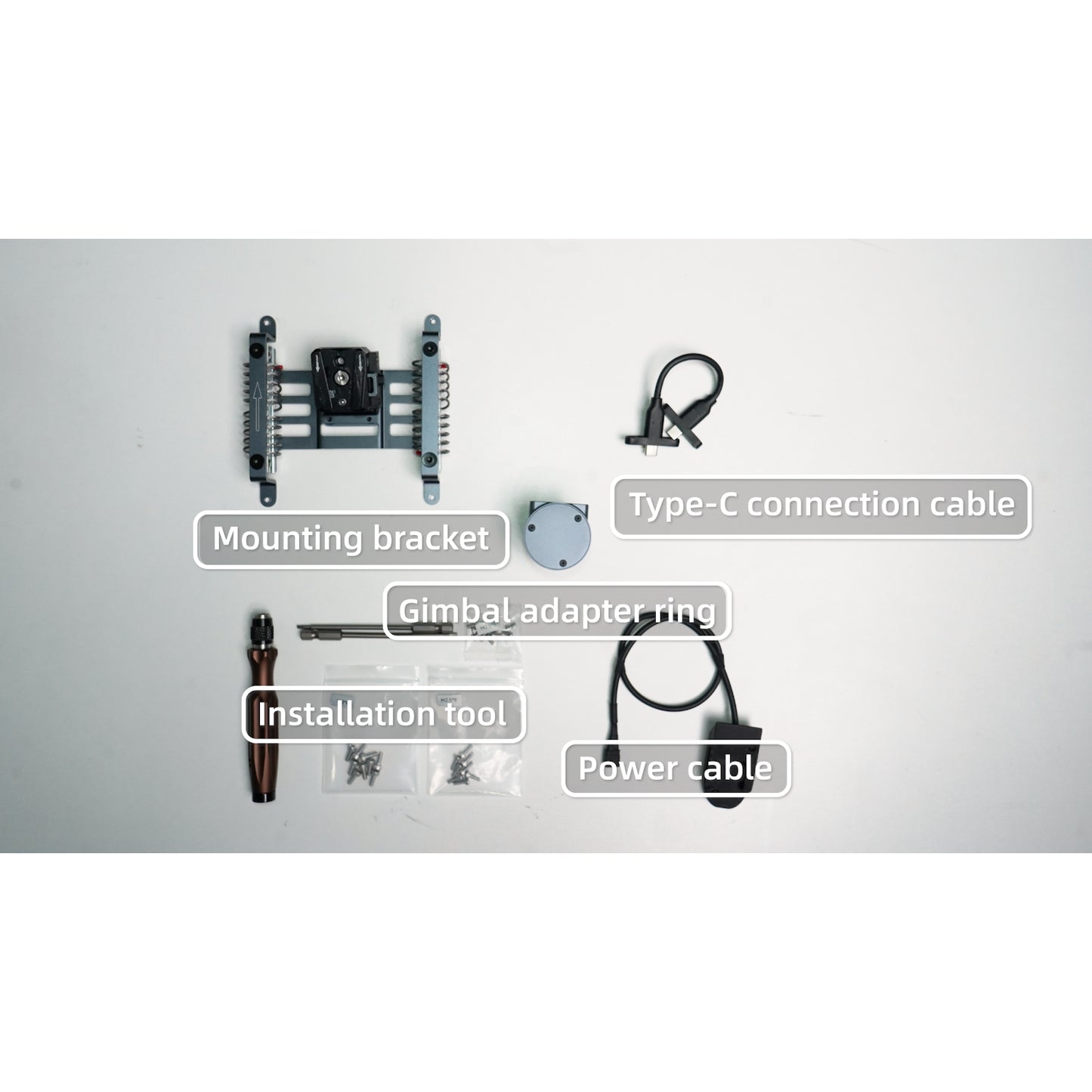 Set of components in the XGRIDS Lixel L2 Pro drone mounting bracket including a mounting bracket, type-C connection cable, gimbal adapter ring, installation tool, and power cable on a white background.