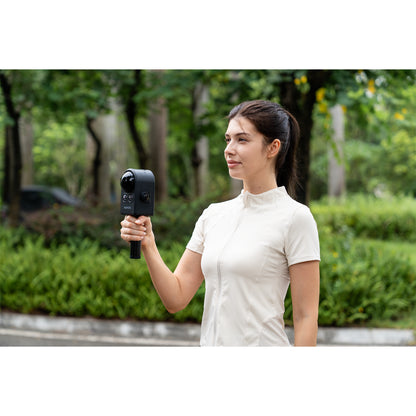 professional using the XGRIDS PortalCam handheld SLAM LiDAR scanner for 3D mapping and BIM documentation