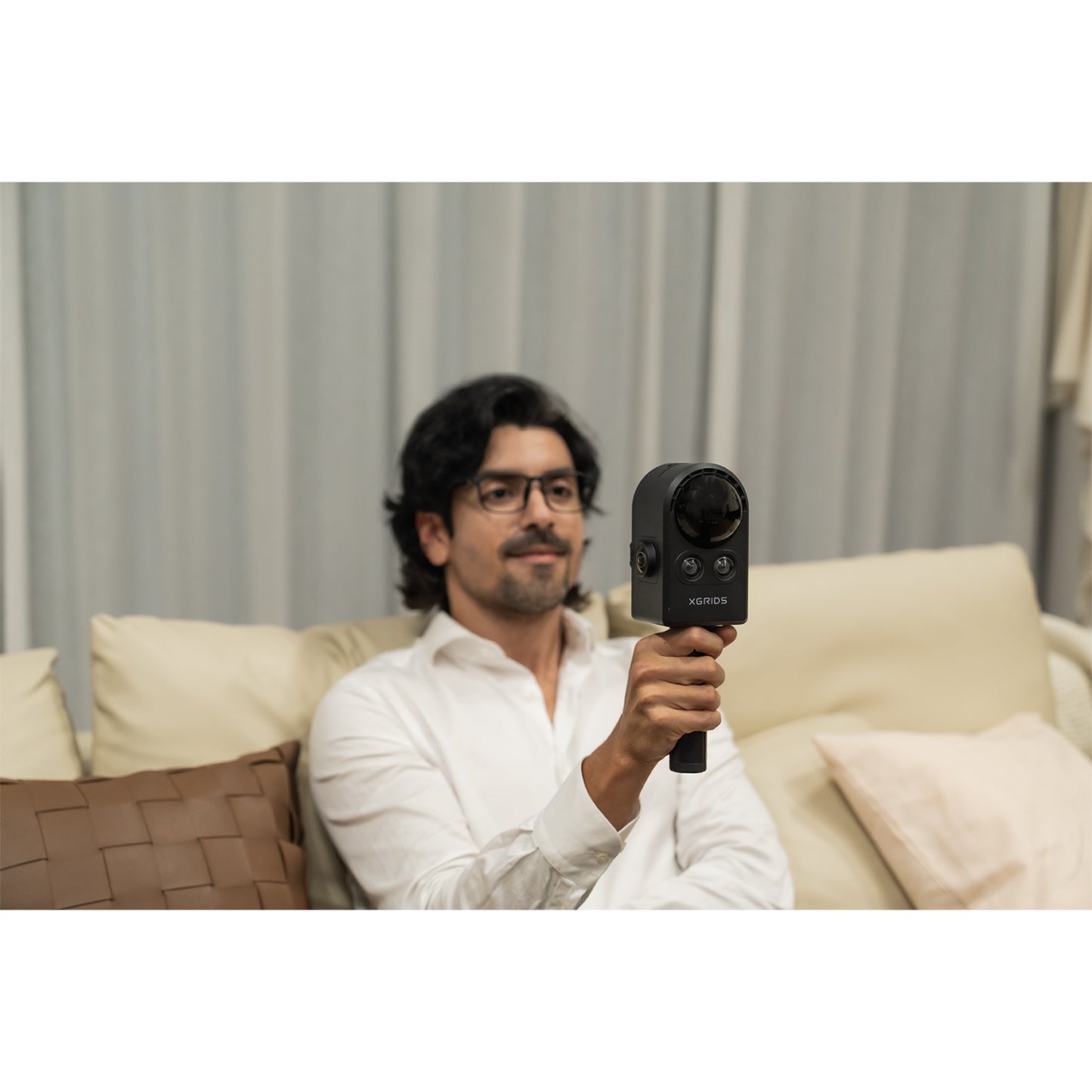handheld mode of XGRIDS PortalCam handheld SLAM LiDAR scanner for Real Estate scanning purposes
